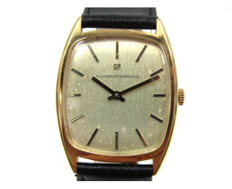 GIRARD PERREGAUX: a gold plated cased gent's manual wind wristwatch of curvex form, foxing to silvered dial, calibre 091-693 