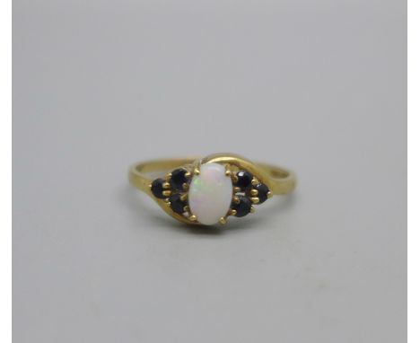 A 9ct gold, opal and sapphire ring, 1.5g, M 