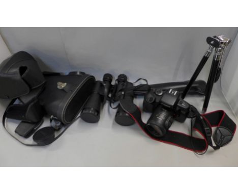 A pair of 10 x 50 binoculars and a Canon EOS700 camera, small tripod and a light meter