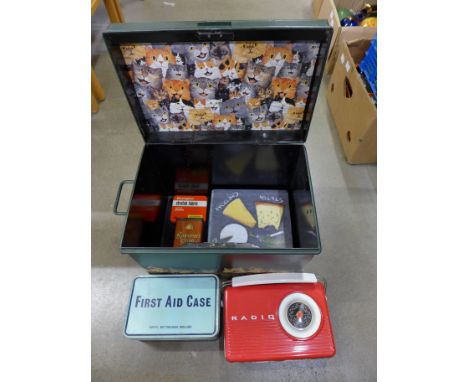 A tin trunk and other tins **PLEASE NOTE THIS LOT IS NOT ELIGIBLE FOR POSTING AND PACKING** 