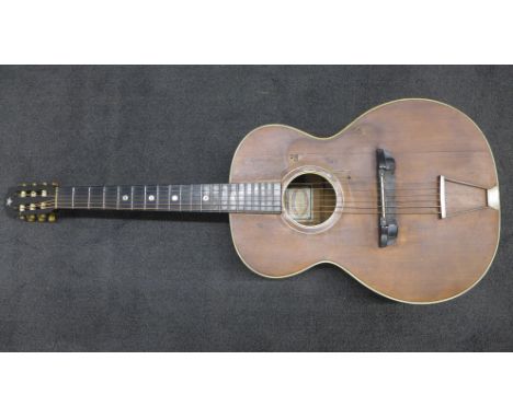 A 1950's Martin Coletti American model acoustic guitar, manufactured in Eastern Europe, a/f (case front split and scratch pla