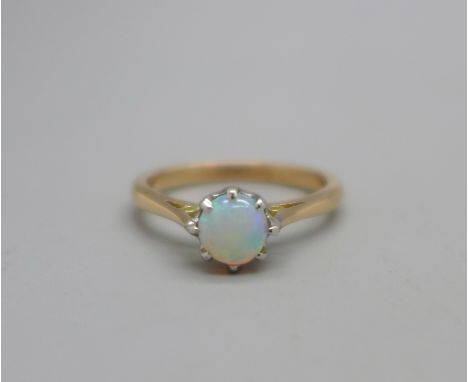 An 18ct gold, opal solitaire ring, 3.4g, O 