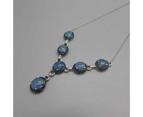 A silver and synthetic opal necklace 