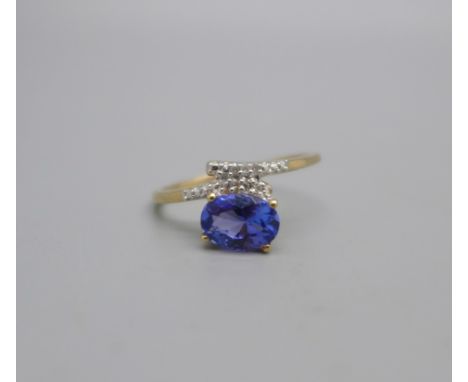 A 9ct gold, tanzanite and diamond ring, 1.9g, O 