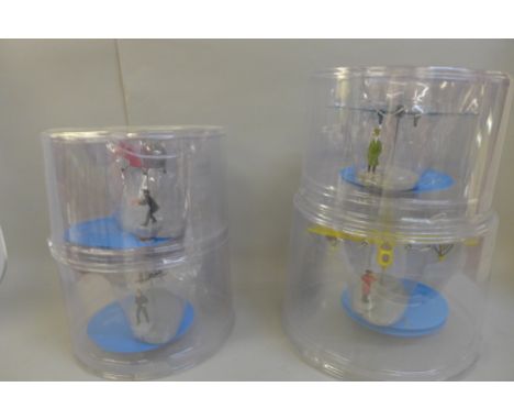 Six TinTin themed die-cast model aircraft, packaged 