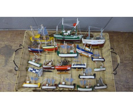 A collection of model fishing boats and trawlers 