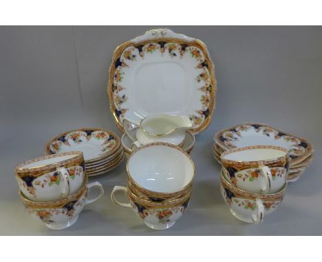 A Sutherland china six setting tea set, two cups a/f,(hairline crack) 