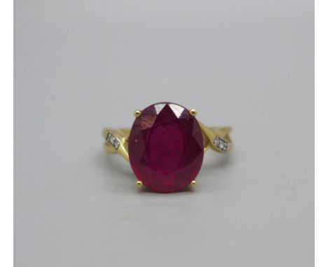 A 9ct gold and red stone ring, 3.8g, Q 