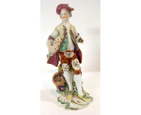 An 18th Century Derby patch mark figure of a shepherd, 24cm high (some restoration)