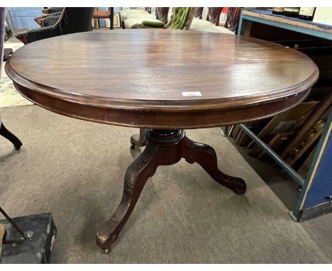 A Victorian mahogany circular dining table on turned column with tripod base (Item 40 on vendor list), top 98cm diameter