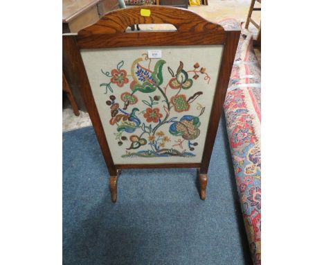 AN OAK GLAZED FIRESCREEN