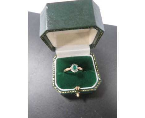 A LADIES 9 CARAT GOLD DRESS RING 