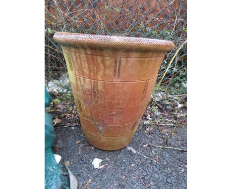 AN EXTRA LARGE TERRACOTTA PLANTER