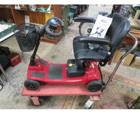 A LIBERTY KOMFI RIDER MOBILITY SCOOTER WITH KEYS - WORKING AT TIME OF CONSIGNMENT HOWEVER WE OFFER NO GUARANTEE AS TO THE WOR