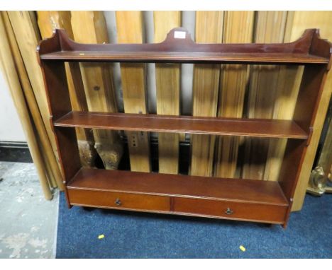 A REPRO MAHOGANY SHELF RACK WITH DRAWERS