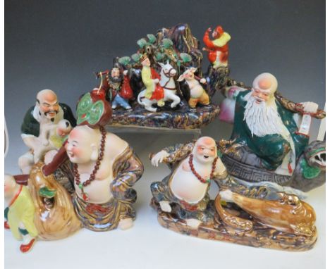 A COLLECTION OF FIVE ASSORTED LARGE ORIENTAL PORCELAIN FIGURES, each dressed in traditional dress, impressed marks, largest H