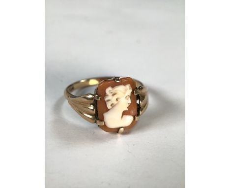 An unmarked yellow metal cameo ring. Size N. 2.2g. m