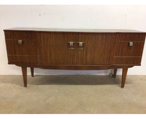 A mid century sideboard by Stonehill furniture double centra doors to interior gilt bound shelf cupboards either. W:167cm x D