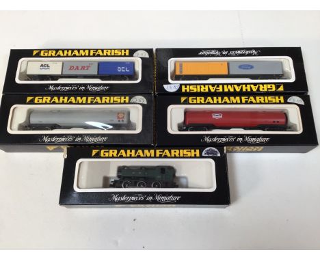 Graham Farish GWR Engine also with four rolling stock carriages. 