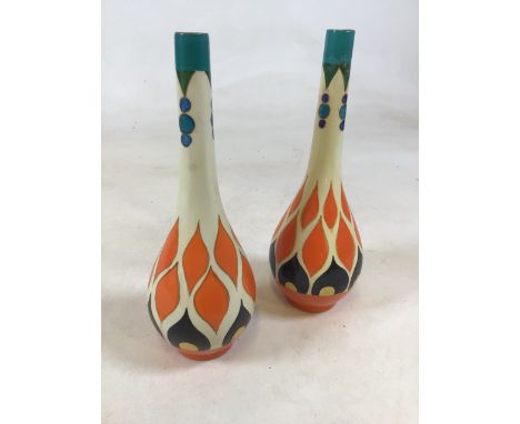 A pair of Arabian Arcadian Ware vases designed by Frederick Rhead with hand painted Art Deco geometric design and printed mar