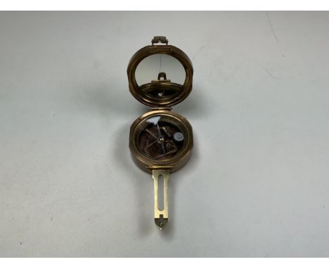 A brass cased Royal Navy Stanley MK1 compass, dated 1941.