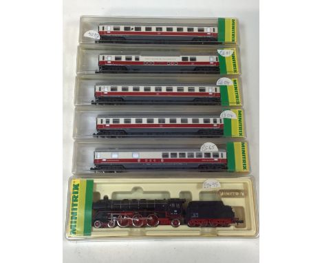 Minitrix engine and tender also with five passenger carriages. 
