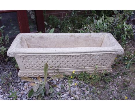 A Cotsworld stone planter. 