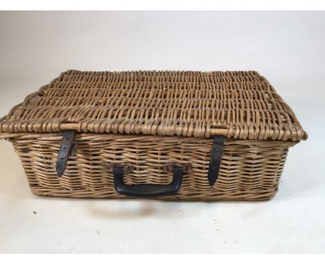 A vintage wicker hamper with a ceramic setting for four together with picnic blanket and map W:55cm x D:38cm x H:17cm