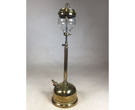 A brass Tilley lamp with original glass shade. Marked TILLEY LAMP CO HENDON ENGLAND. H:60cm