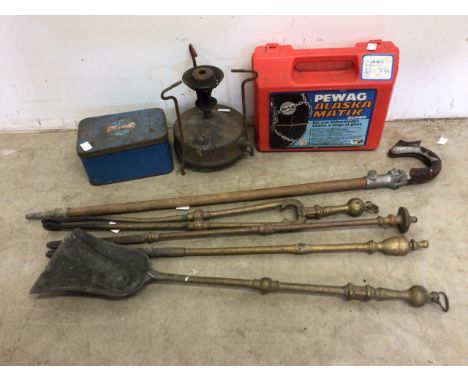 Heavy brass fire irons and a shooting stick metal burners also with a set of snow chains. 
