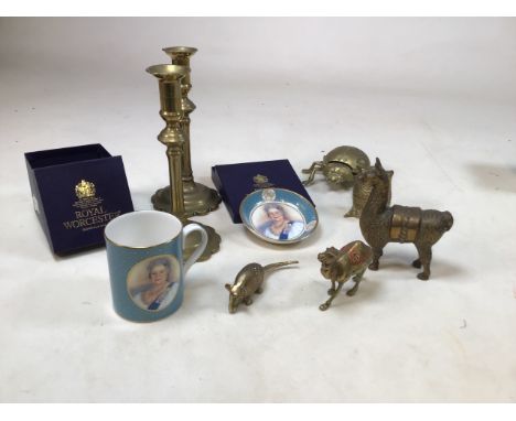 A collection of brass animals and a pair of brass candlesticks together with two boxes Royal Worcester Queen mother commemora