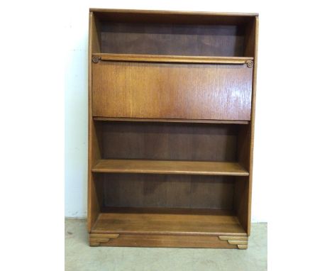 A set oak of Art Deco bookshelves with drop down front to interior desk. W:76cm x D:26cm x H:109cm