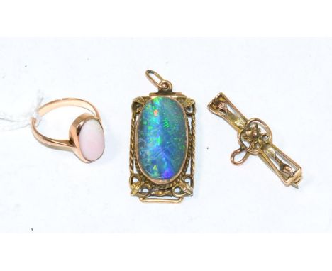 A black opal pendant, a coral ring, stamped '9CT' and a brooch (3)