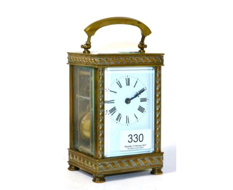 A brass striking carriage clock 