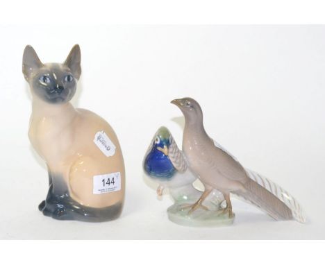 A Royal Copenhagen porcelain model of a seated Siamese cat, 20cm high; and a similar group of pheasants, 15cm high (2)