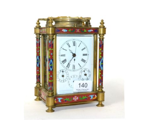 A reproduction brass enamel striking and repeating calendar alarm centre seconds carriage clock 