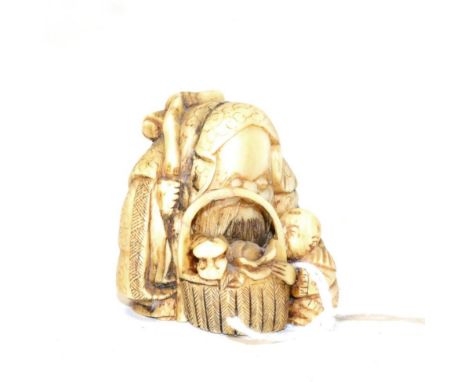 Late 19th century Japanese ivory netsuke, figure with child and basket 