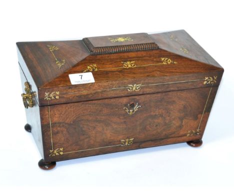 A rosewood and mother of pearl inlaid tea caddy 
