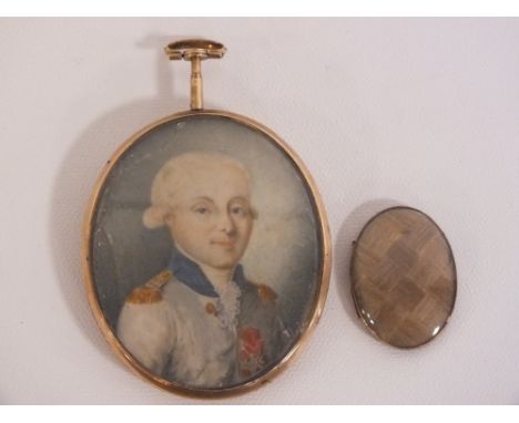 (XIX). Oval portrait miniature on ivory of a military gentleman, unsinged, framed and glazed, 6 x 5 cm, together with a frame