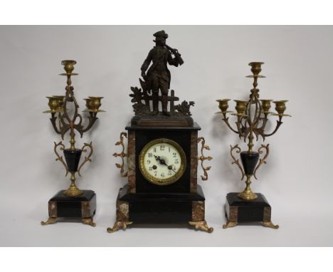 A BLACK SLATE AND MARBLE CLOCK GARNITURE, the clock with 8 day movement striking on a single bell, having circular enamel dia