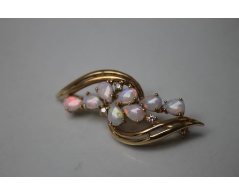 A MODERN OPAL AND GEMSET CROSSOVER BROOCH STAMPED 9K, W 4.3 cm, approximate weight 6.1 g