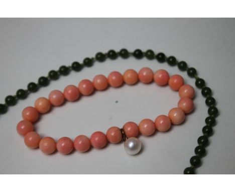 A SINGLE STRAND OF HAND KNOTTED SPINACH JADE BEADS, overall L 44 cm, together with a dyed bone bracelet (2)