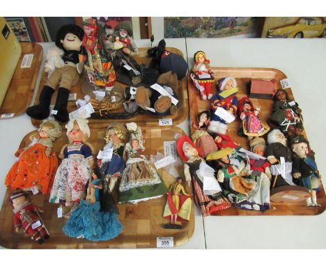 Six trays of International collectors dolls to include: figure of a Bushman, New Zealand 'Kiwi Friends' sheep farmer with she