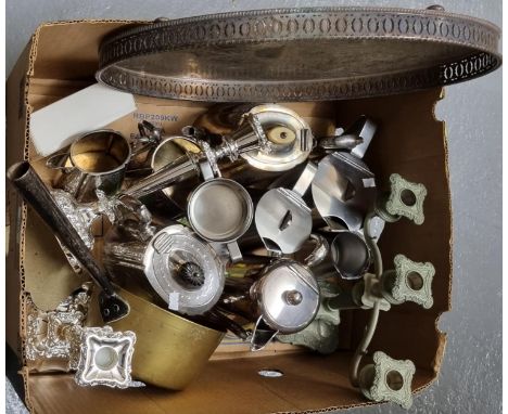 A box of assorted metalware to include: an oval white metal, intricately engraved, serving tray, copper saucepan, candlestick