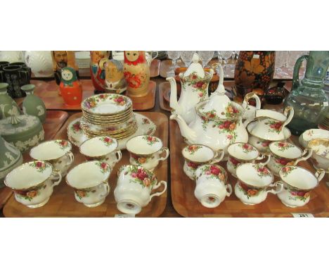 Two trays of Royal Albert 'Old Country Roses' English fine bone china tea and coffee ware to include; teapot, coffee pot, mil