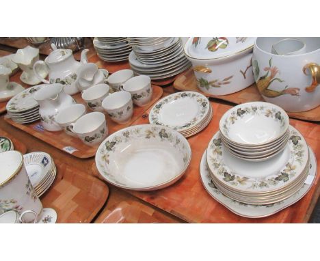 Two trays of Royal Doulton English translucent china 'Larchmont' design tea and dinnerware to include; teapot, water jug, sug