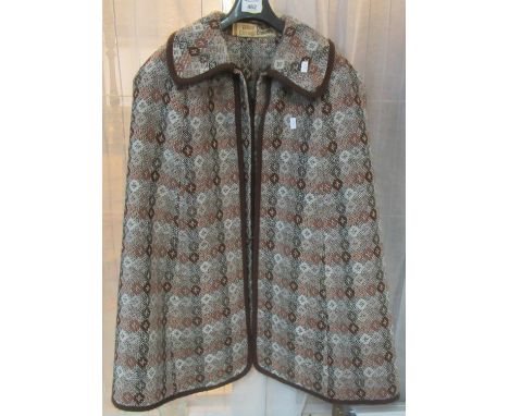 Vintage Welsh tapestry waistcoat with sewn over cloak with 'Corwgl Clothes, Swansea, Wales' label. (B.P. 21% + VAT) 