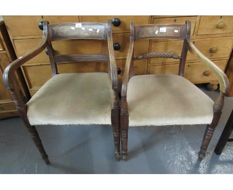 Two similar Regency mahogany open arm carver chairs with moulded bar backs, stuff over seats and baluster and ring turned fro