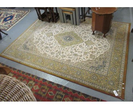 Modern Persian design cream and mustard ground carpet, overall with flowers and foliage and central lozenge medallion.  230 x