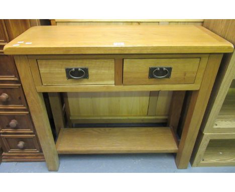 Good quality modern oak two drawer console table with under-tier with square legs. (B.P. 21% + VAT) Dimensions -  85 x 32 x 7